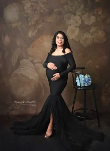 Maternity Photoshoot in Black Gown posing