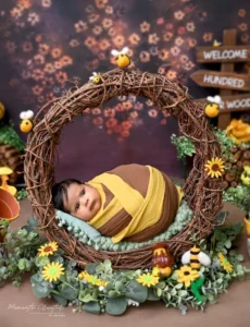 best-newborn-photographer-delhi-ncr-winnie-pooh-yellow-brown-wrap-twig-wreath-sunflowers-38