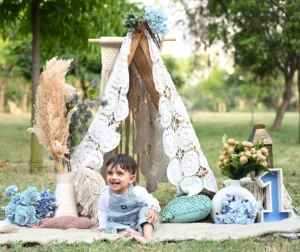 first-birthday-photoshoot-gurgaon-outdoor-boho-blue-knit-lace-teepee-hydrangea-43