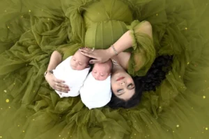 newborn-portrait-session-delhi-ncr-twins-mother-aerial-olive-gown-flatlay-14