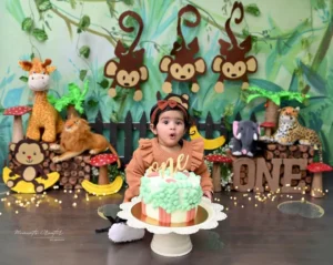 pre-birthday-photoshoot-delhi-cake-smash-jungle-rust-orange-monkey-headband-green-49