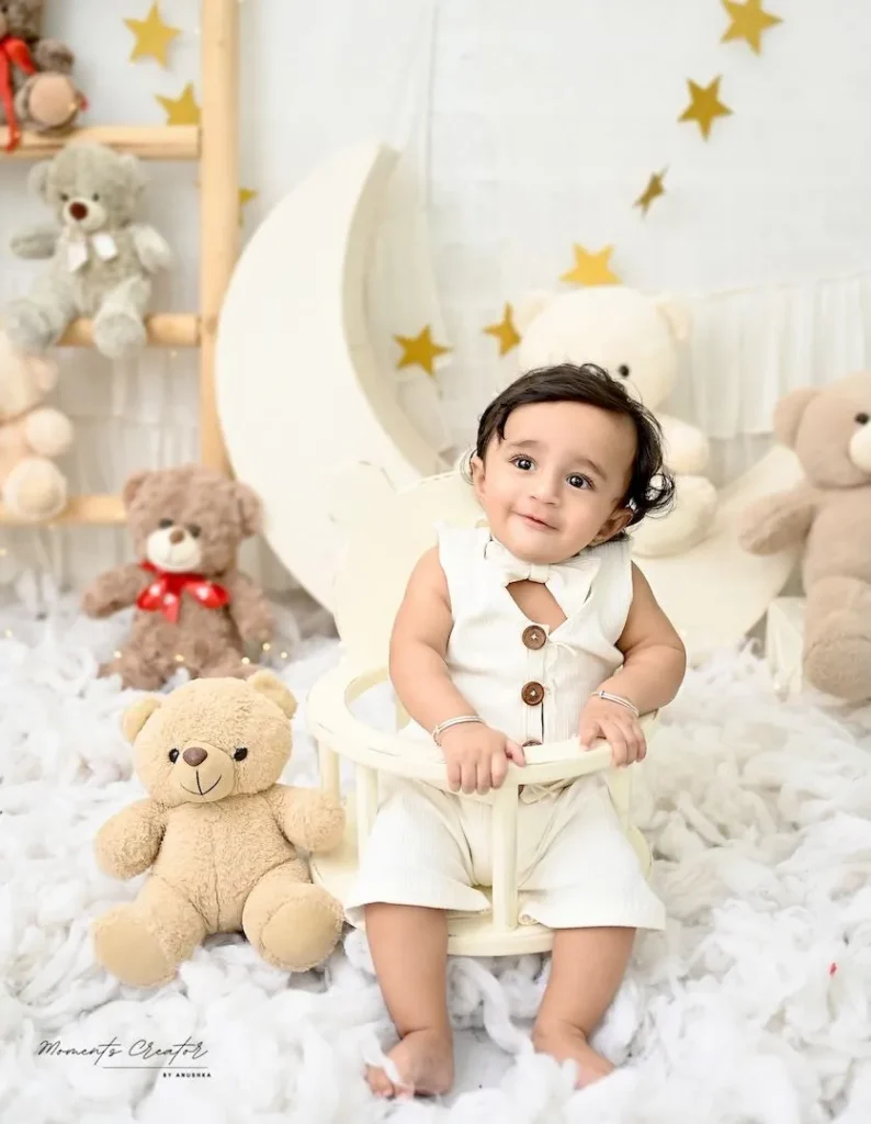 top sitter photoshoot delhi ncr baby boy smiling moon stars teddy bears